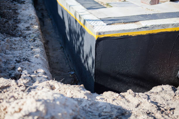 Professional Emergency Waterproofing technician working in Grand Marsh, WI